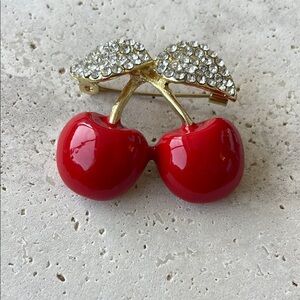 Macy's Red and Gold Hair Accessory with Crystal Embellishments